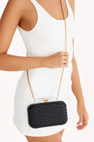 Neveah Woven Clutch