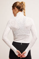 Free People Clothing Tempo Jacquard Turtleneck Style OB2119725 in white animal combo; Winter Active Layering top;  Free PEople Movement Layering Top